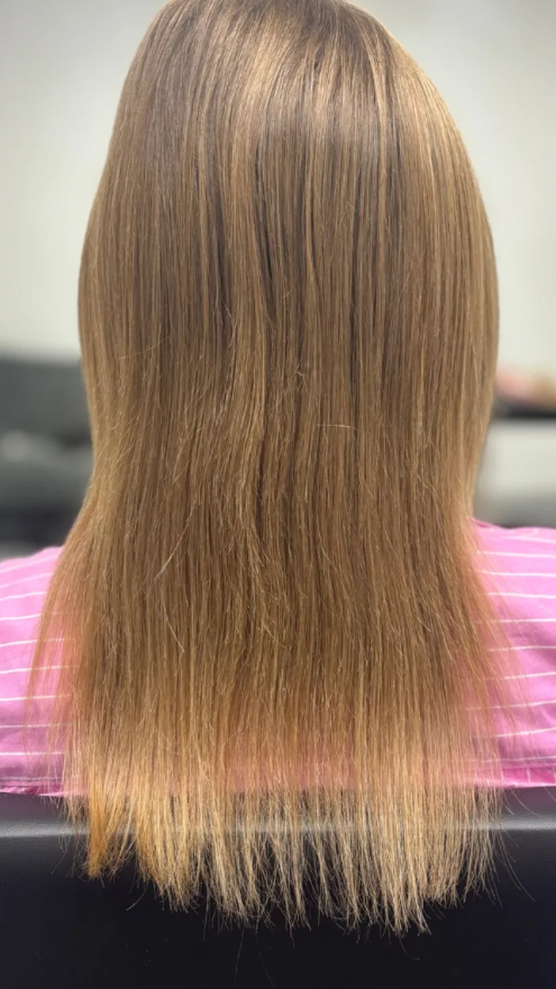 Hair extensions: dark blonde, shoulder blades to waist — before